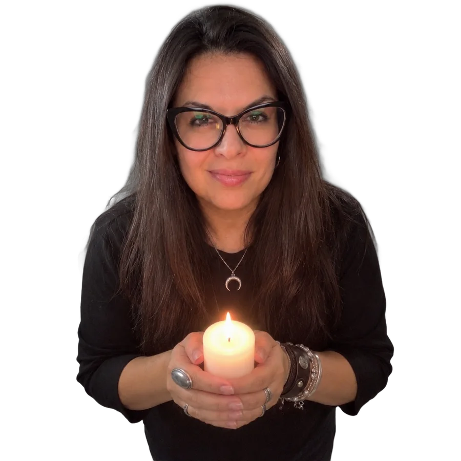 Amani holding a candle